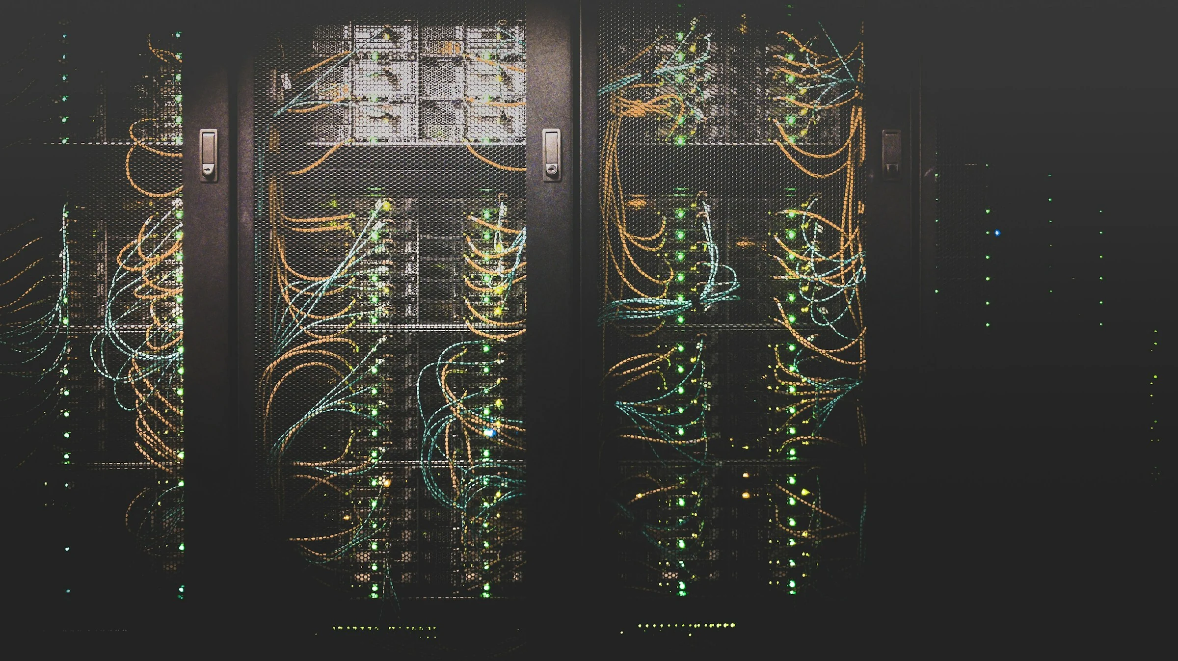 Enterprise data center server room with high-density server enclosures and cabling