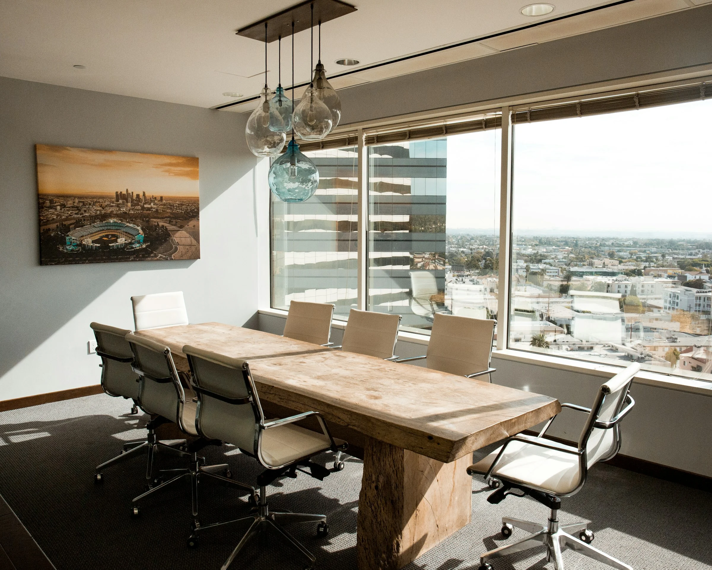 Enterprise video conferencing boardroom with integrated acoustic and display systems