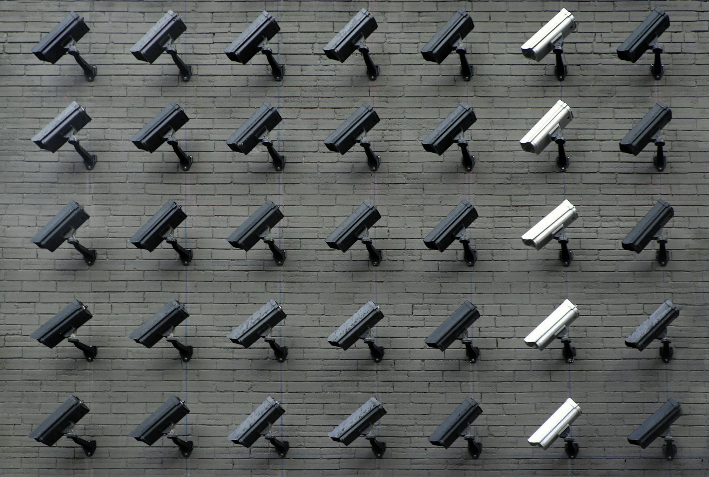 Enterprise Security Operations Center with multi-screen CCTV video surveillance monitoring